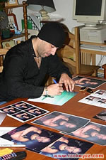 Lee Cee signs autographs for fans